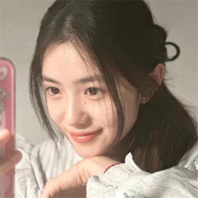 桃花含露又春风